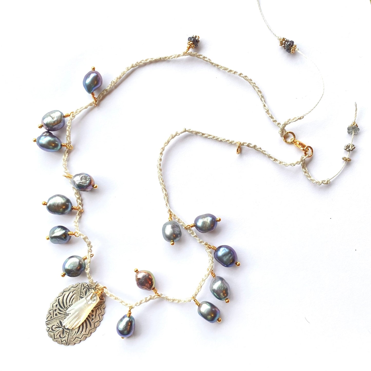 Mother of pearl hand with fresh water pearl crochet necklaces