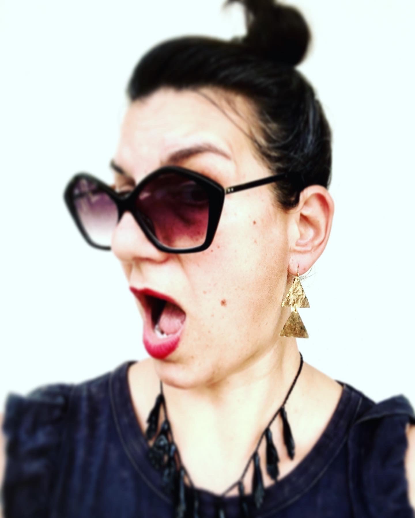 Modern hand hammered two Tribal triangles earrings