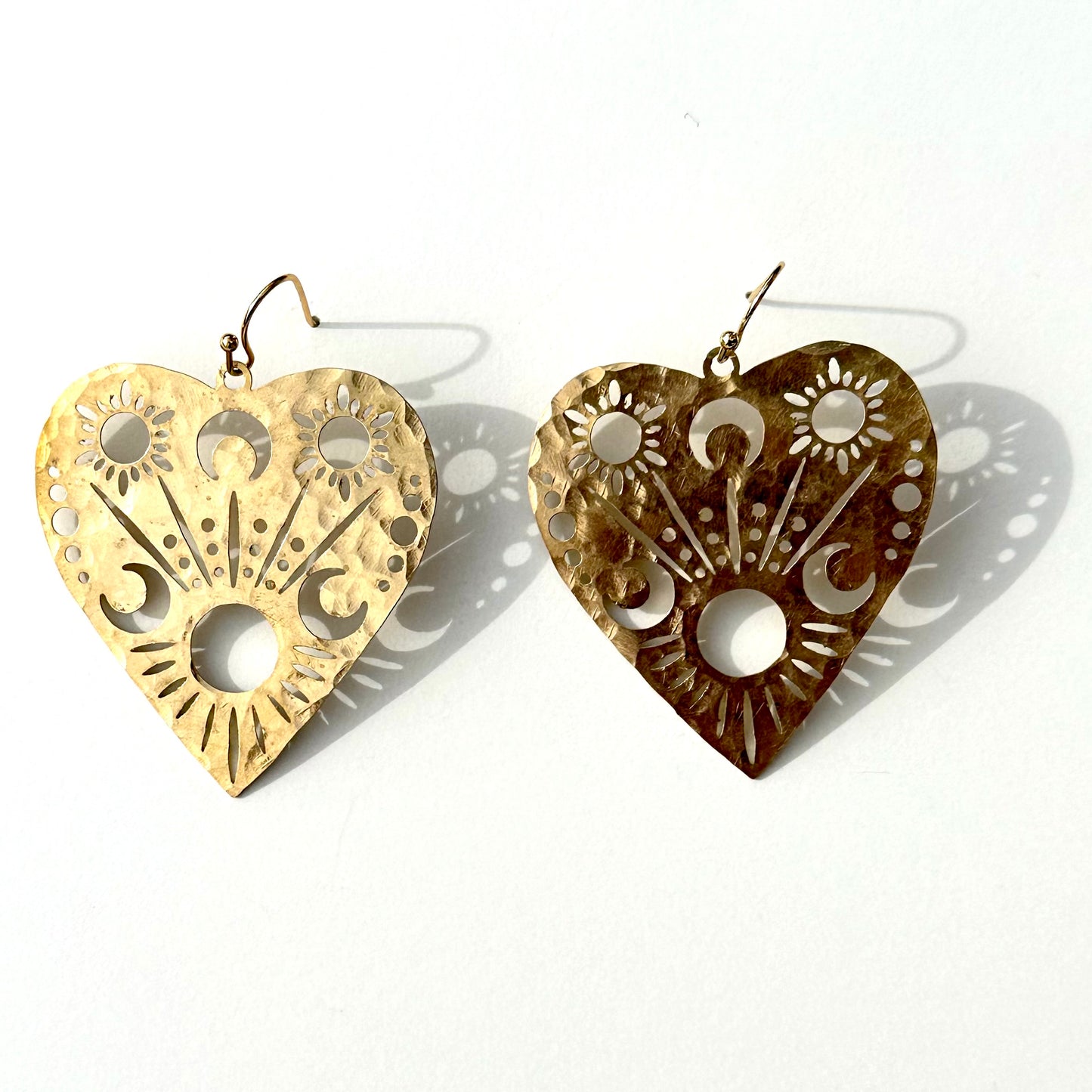 Large heart hand hammered earrings